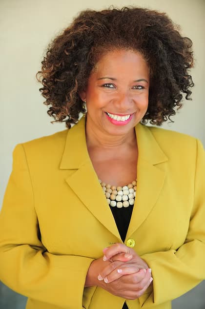 Lorey Hayes in a yellow jacket